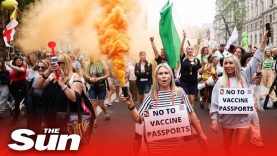 Anti-vaccine passport protesters march in London standing against Covid-19 government mandates