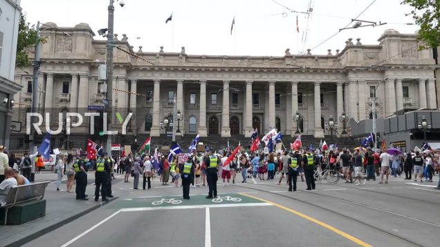 Australia: Anti COVID restrix demonstrators rally through Melbourne streets