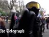 TV crew attacked as protest against Covid measures turns violent